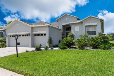 WELCOME to this stunning 4 bedroom/3 full bath/3 car garage home on Heritage Pines Country Club in Florida - for sale on GolfHomes.com, golf home, golf lot