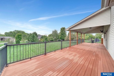 Nestled among the scenic Hi-Mark golf couse, this stunning on Pine Lake Golf and Tennis Club in Nebraska - for sale on GolfHomes.com, golf home, golf lot