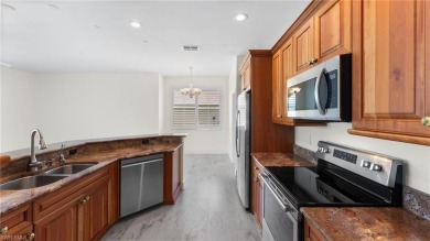 Welcome to this beautifully designed two-story pool home on Stoneybrook Golf Club in Florida - for sale on GolfHomes.com, golf home, golf lot