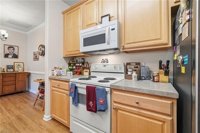 Second story condo with elevator. Covered balcony.  Large open on The Signature At West Neck in Virginia - for sale on GolfHomes.com, golf home, golf lot