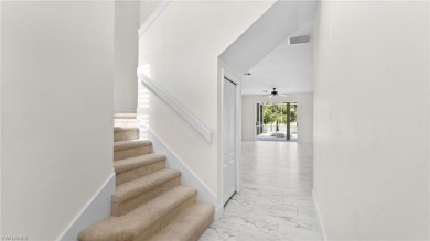 Welcome to this beautifully designed two-story pool home on Stoneybrook Golf Club in Florida - for sale on GolfHomes.com, golf home, golf lot