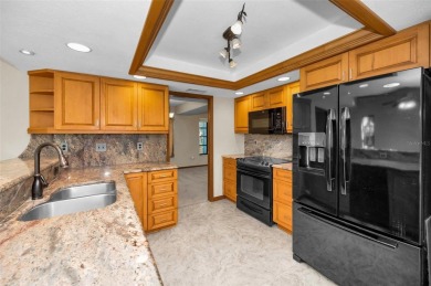 One or more photo(s) has been virtually staged. The perfect on Tarpon Woods Golf Club in Florida - for sale on GolfHomes.com, golf home, golf lot