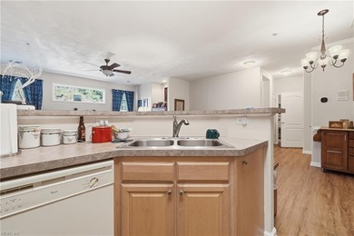 Second story condo with elevator. Covered balcony.  Large open on The Signature At West Neck in Virginia - for sale on GolfHomes.com, golf home, golf lot