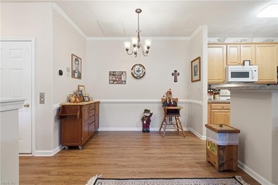 Second story condo with elevator. Covered balcony.  Large open on The Signature At West Neck in Virginia - for sale on GolfHomes.com, golf home, golf lot