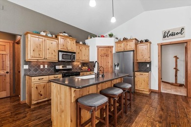 This open-concept 2-bedroom, 2.5-bathroom single-level townhouse on Meadow Lake Golf Resort in Montana - for sale on GolfHomes.com, golf home, golf lot