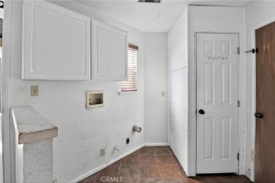 Welcome to 14702 Robin Ln, a spacious 4-bedroom, 2-bath home on Silver Lakes Golf Course in California - for sale on GolfHomes.com, golf home, golf lot