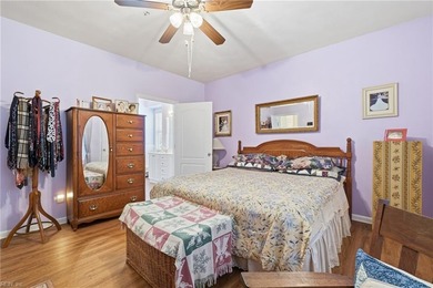 Second story condo with elevator. Covered balcony.  Large open on The Signature At West Neck in Virginia - for sale on GolfHomes.com, golf home, golf lot