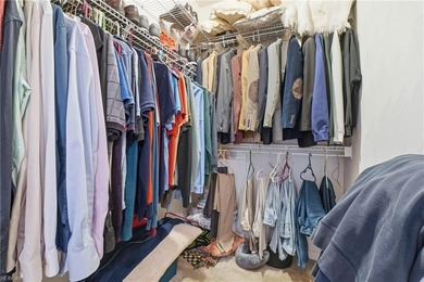 Second story condo with elevator. Covered balcony.  Large open on The Signature At West Neck in Virginia - for sale on GolfHomes.com, golf home, golf lot