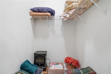 Second story condo with elevator. Covered balcony.  Large open on The Signature At West Neck in Virginia - for sale on GolfHomes.com, golf home, golf lot