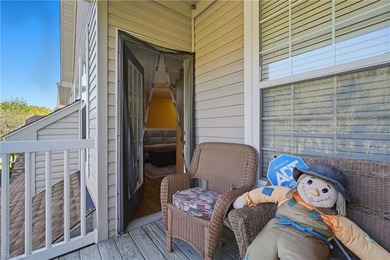 Second story condo with elevator. Covered balcony.  Large open on The Signature At West Neck in Virginia - for sale on GolfHomes.com, golf home, golf lot