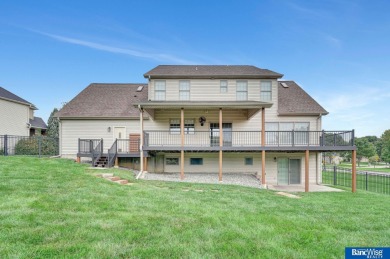 Nestled among the scenic Hi-Mark golf couse, this stunning on Pine Lake Golf and Tennis Club in Nebraska - for sale on GolfHomes.com, golf home, golf lot