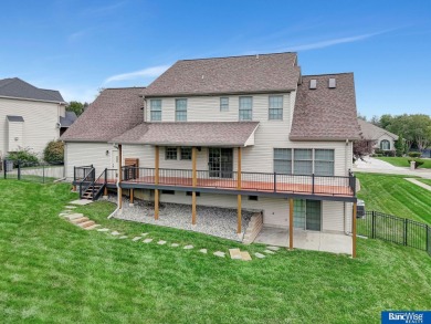 Nestled among the scenic Hi-Mark golf couse, this stunning on Pine Lake Golf and Tennis Club in Nebraska - for sale on GolfHomes.com, golf home, golf lot