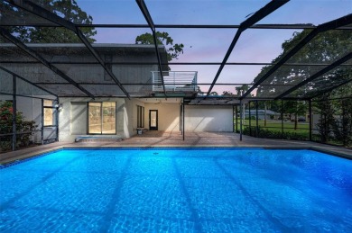 One or more photo(s) has been virtually staged. The perfect on Tarpon Woods Golf Club in Florida - for sale on GolfHomes.com, golf home, golf lot