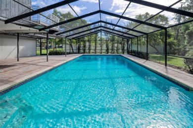 Under contract-accepting backup offers. One or more photo(s) has on Tarpon Woods Golf Club in Florida - for sale on GolfHomes.com, golf home, golf lot