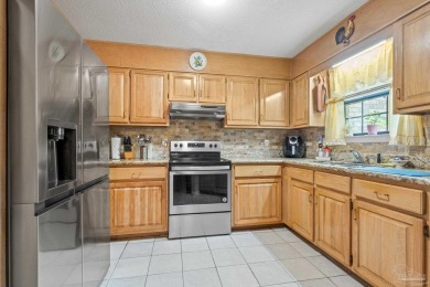 All Brick, 3 bedroom, 2 bathroom home located within the on Tanglewood Golf Club in Florida - for sale on GolfHomes.com, golf home, golf lot