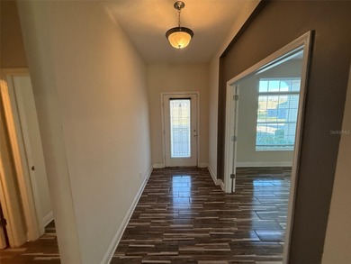 Welcome home to this beautifully appointed 4-bedroom, 3.5-bath on Harmony Golf Preserve in Florida - for sale on GolfHomes.com, golf home, golf lot