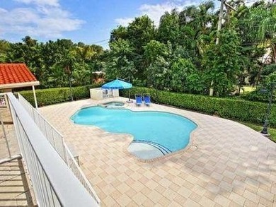 This is an Entertainers home! Walking distance to Granada Golf on Granada Golf Club in Florida - for sale on GolfHomes.com, golf home, golf lot