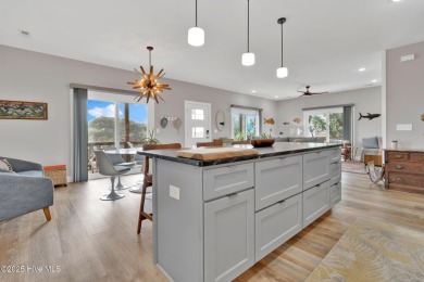 Oceanside Living on Oak Island! This 3-bedroom, 2.5-bath piling on Founders Club At St. James Plantation in North Carolina - for sale on GolfHomes.com, golf home, golf lot