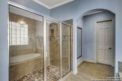 Behind the guard-gated entrance of Stone Oak's prestigious on Canyon Springs Golf Club in Texas - for sale on GolfHomes.com, golf home, golf lot