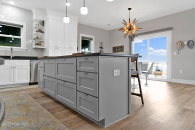 Oceanside Living on Oak Island! This 3-bedroom, 2.5-bath piling on Founders Club At St. James Plantation in North Carolina - for sale on GolfHomes.com, golf home, golf lot