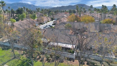 Welcome to this beautiful single-story San Jacinto model condo on Sun Lakes Country Club in California - for sale on GolfHomes.com, golf home, golf lot