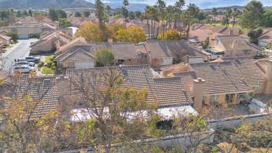 Welcome to this beautiful single-story San Jacinto model condo on Sun Lakes Country Club in California - for sale on GolfHomes.com, golf home, golf lot