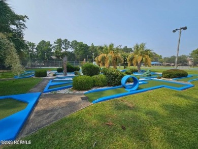 This stunning, never-before-lived-in model home is now available on Harbour Point Golf Club in North Carolina - for sale on GolfHomes.com, golf home, golf lot