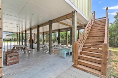 Oceanside Living on Oak Island! This 3-bedroom, 2.5-bath piling on Founders Club At St. James Plantation in North Carolina - for sale on GolfHomes.com, golf home, golf lot