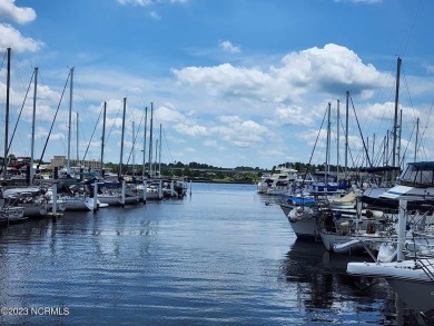 This stunning, never-before-lived-in model home is now available on Harbour Point Golf Club in North Carolina - for sale on GolfHomes.com, golf home, golf lot