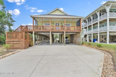 Oceanside Living on Oak Island! This 3-bedroom, 2.5-bath piling on Founders Club At St. James Plantation in North Carolina - for sale on GolfHomes.com, golf home, golf lot
