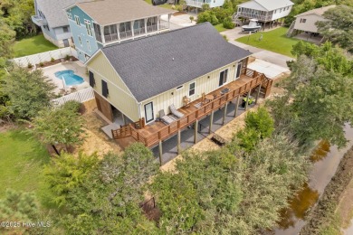 Oceanside Living on Oak Island! This 3-bedroom, 2.5-bath piling on Founders Club At St. James Plantation in North Carolina - for sale on GolfHomes.com, golf home, golf lot