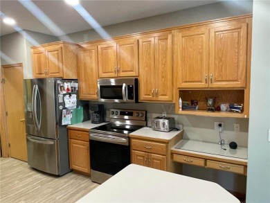 Great chance to own a rambler style end unit in a 55+ community on The Ponds Golf Club in Minnesota - for sale on GolfHomes.com, golf home, golf lot