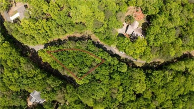 Build your dream home on this beautiful vacant lot in the on The Highlands Course at Lake Arrowhead in Georgia - for sale on GolfHomes.com, golf home, golf lot