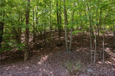 Build your dream home on this beautiful vacant lot in the on The Highlands Course at Lake Arrowhead in Georgia - for sale on GolfHomes.com, golf home, golf lot