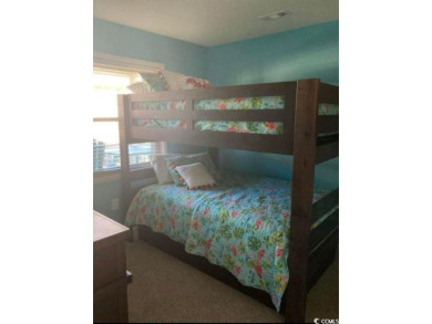 This great 4 bedroom, 3 bath cottage is one block from beach on The Dunes Golf and Beach Club in South Carolina - for sale on GolfHomes.com, golf home, golf lot
