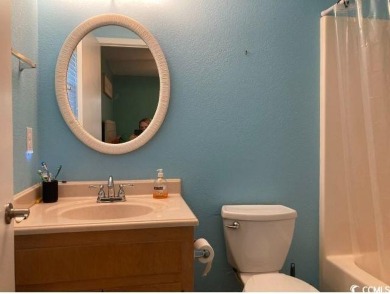 This great 4 bedroom, 3 bath cottage is one block from beach on The Dunes Golf and Beach Club in South Carolina - for sale on GolfHomes.com, golf home, golf lot