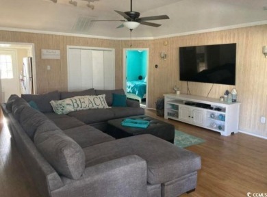This great 4 bedroom, 3 bath cottage is one block from beach on The Dunes Golf and Beach Club in South Carolina - for sale on GolfHomes.com, golf home, golf lot