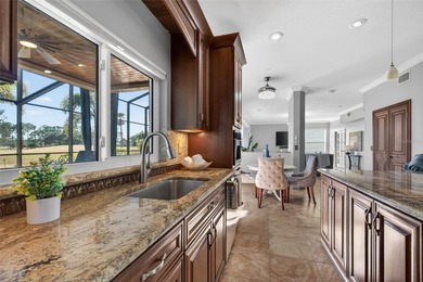 Stately golf course estate in the exclusive St. Andrews enclave on The Eagles Golf Course and Club in Florida - for sale on GolfHomes.com, golf home, golf lot