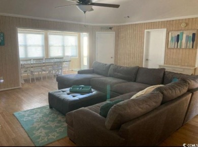 This great 4 bedroom, 3 bath cottage is one block from beach on The Dunes Golf and Beach Club in South Carolina - for sale on GolfHomes.com, golf home, golf lot