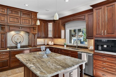 Stately golf course estate in the exclusive St. Andrews enclave on The Eagles Golf Course and Club in Florida - for sale on GolfHomes.com, golf home, golf lot