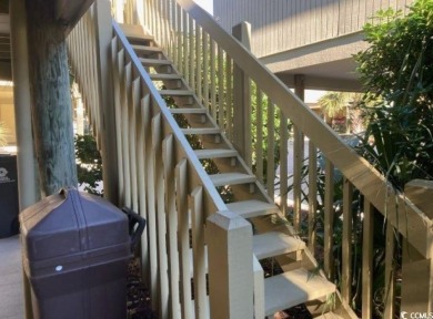 This great 4 bedroom, 3 bath cottage is one block from beach on The Dunes Golf and Beach Club in South Carolina - for sale on GolfHomes.com, golf home, golf lot