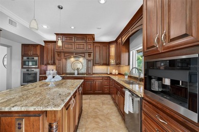 Stately golf course estate in the exclusive St. Andrews enclave on The Eagles Golf Course and Club in Florida - for sale on GolfHomes.com, golf home, golf lot