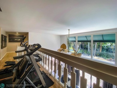 From the moment you enter you are greeted with natural light on Jacaranda Golf Club in Florida - for sale on GolfHomes.com, golf home, golf lot