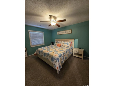 This great 4 bedroom, 3 bath cottage is one block from beach on The Dunes Golf and Beach Club in South Carolina - for sale on GolfHomes.com, golf home, golf lot