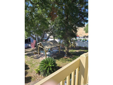 This great 4 bedroom, 3 bath cottage is one block from beach on The Dunes Golf and Beach Club in South Carolina - for sale on GolfHomes.com, golf home, golf lot