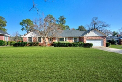 This charming brick ranch home is located in a prestigious gated on Santee-Cooper Country Club in South Carolina - for sale on GolfHomes.com, golf home, golf lot