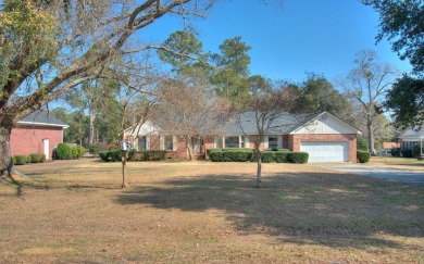 This charming brick ranch home is located in a prestigious gated on Santee-Cooper Country Club in South Carolina - for sale on GolfHomes.com, golf home, golf lot