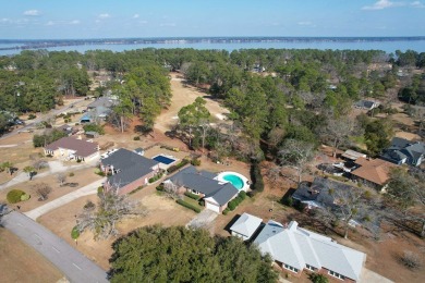 This charming brick ranch home is located in a prestigious gated on Santee-Cooper Country Club in South Carolina - for sale on GolfHomes.com, golf home, golf lot