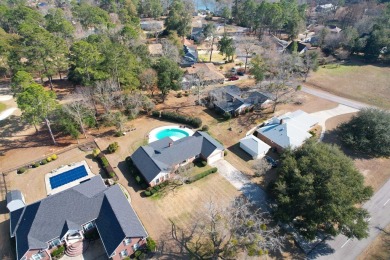 This charming brick ranch home is located in a prestigious gated on Santee-Cooper Country Club in South Carolina - for sale on GolfHomes.com, golf home, golf lot