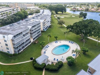 This is it! Absolutely stunning first-floor unit in sought-after on Atlantis Golf Club in Florida - for sale on GolfHomes.com, golf home, golf lot